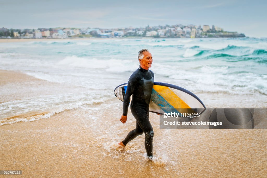 Senior Man and Surf Board