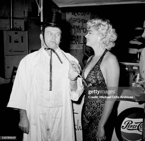 Barbara Nichols and Johnny Grant attend a Halloween party in Los Angeles,CA.