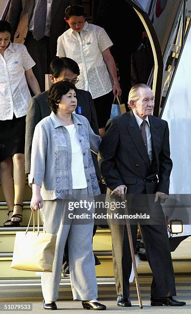 Alleged U.S. Army deserter Charles Jenkins and his wife Hitomi Soga arrive at Haneda International Airport July 18, 2004 in Tokyo. The U.S. Army has...