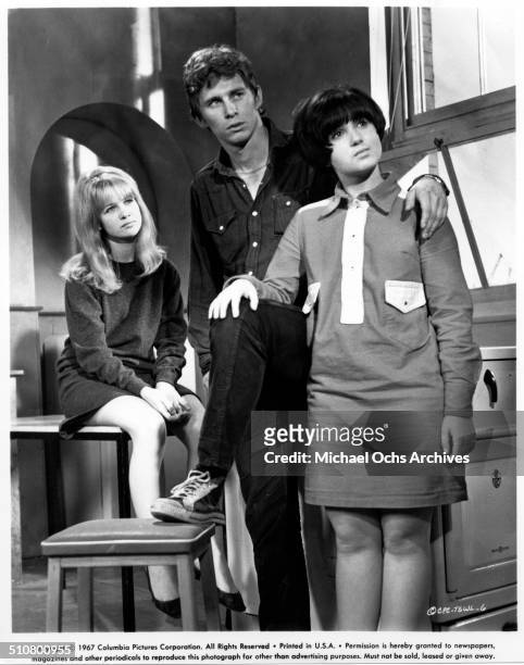 Judy Geeson, Christian Roberts and Adrienne Posta look on in a scene from the Columbia Pictures movie "To Sir, with Love", circa 1967.