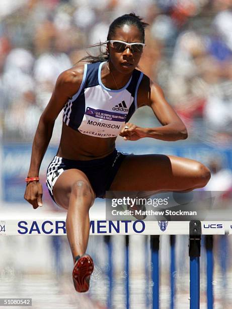 Melissa Morrison competes in the women's 100 Meter Hurdles Preliminary during the U.S. Olympic Team Track & Field Trials on July 17, 2004 at the Alex...