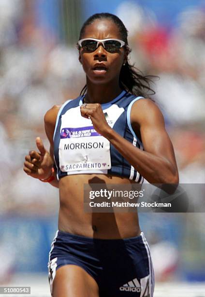 Melissa Morrison competes in the women's 100 Meter Hurdles Preliminary during the U.S. Olympic Team Track & Field Trials on July 17, 2004 at the Alex...