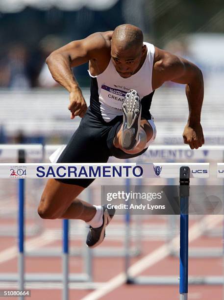 Mark Crear competes in the men's 200 meter hurdles quarterfinals during the U.S. Olympic Team Track & Field Trials on July 17, 2004 at the Alex G....