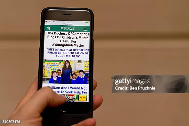 In this photo illustration, the Huffington Post homepage is shown on an Apple Iphone 6 on February 17, 2016 in London, England. Today The Duchess Of...