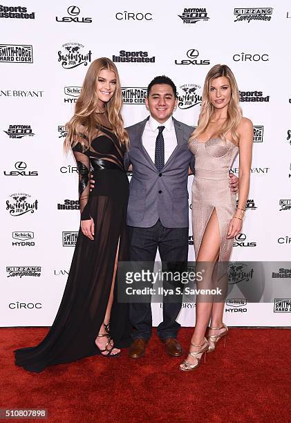 SchickMagnet contest winner Jorge Anaya poses on a red carpet with models Nina Agdal and Samantha Hoopes as they team up with Edge Shavel Gel and...