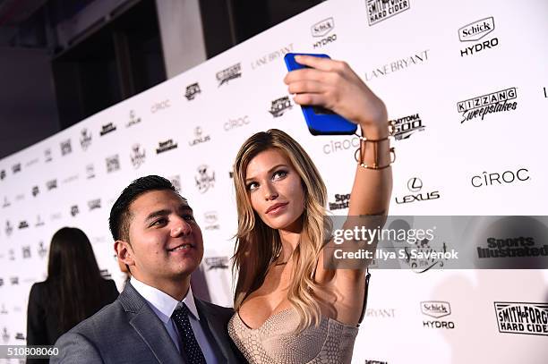 SchickMagnet contest winner Jorge Anaya poses for a selfie on a red carpet with model Samantha Hoopes as she teams up with Schick Hydro to celebrate...