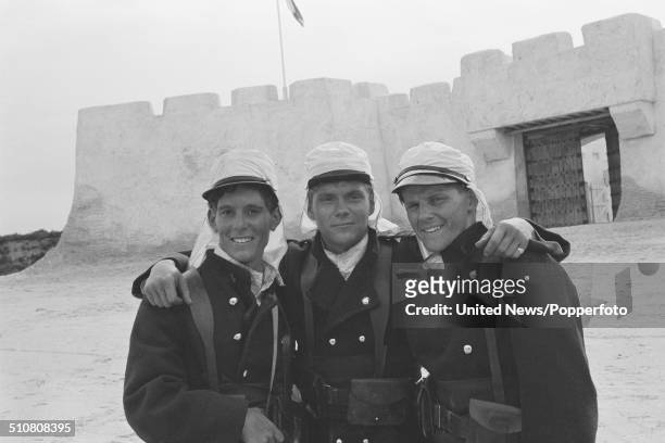 Actors Jonathon Morris, Benedict Taylor and Anthony Calf dressed in character as the Geste brothers in the television series Beau Geste on location...