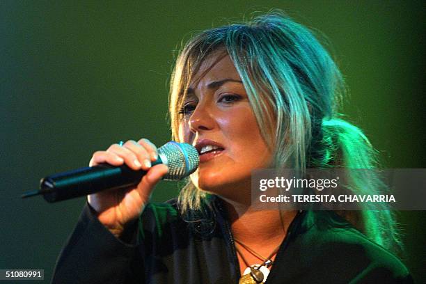 Spanish singer Amaia Montero of the group "La Oreja de Van Gogh" sings at the ATLAPA Convention Center, 18 July 2004, in Panama City. Van Gogh's Ears...