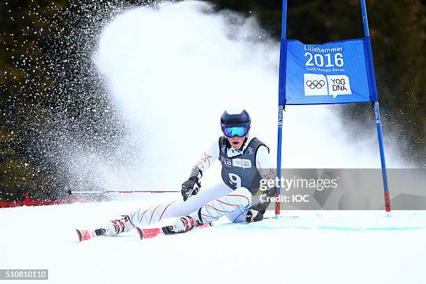 In this handout image supplied by the IOC, River Radamus of USA on his way to winning the Gold Medal in the Alpine Skiing Men's Giant Slalom at the...