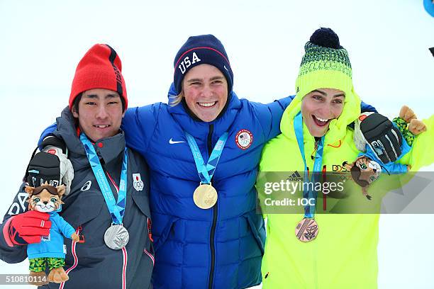 In this handout image supplied by the IOC, Gold medalist River Radamus of USA poses with silver medalist Yohei Koyama of Japan and bronze medalist...