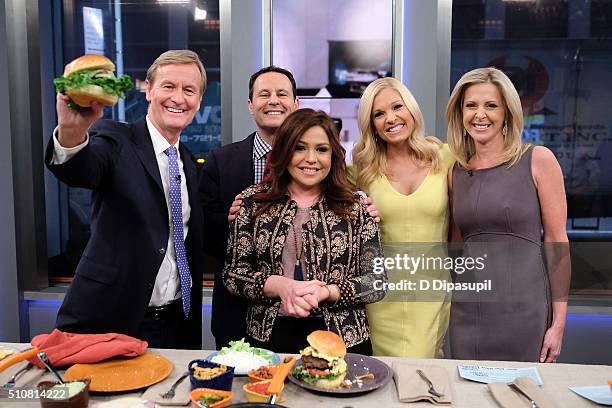 Steve Doocy, Brian Kilmeade, Rachael Ray, Anna Kooiman, and Cheryl Casone pose on the set of Fox & Friends at FOX Studios on February 17, 2016 in New...