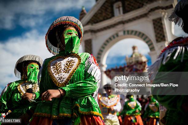 dancers in masks and costume, fiesta de la virgen de la candelaria, copacabana, lake titicaca, bolivia, south america - virgen de la candelaria fiesta stock pictures, royalty-free photos & images