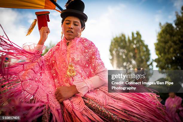 female dancer in pink costume, fiesta de la virgen de la candelaria, copacabana, lake titicaca, bolivia, south america - virgen de la candelaria fiesta stock pictures, royalty-free photos & images