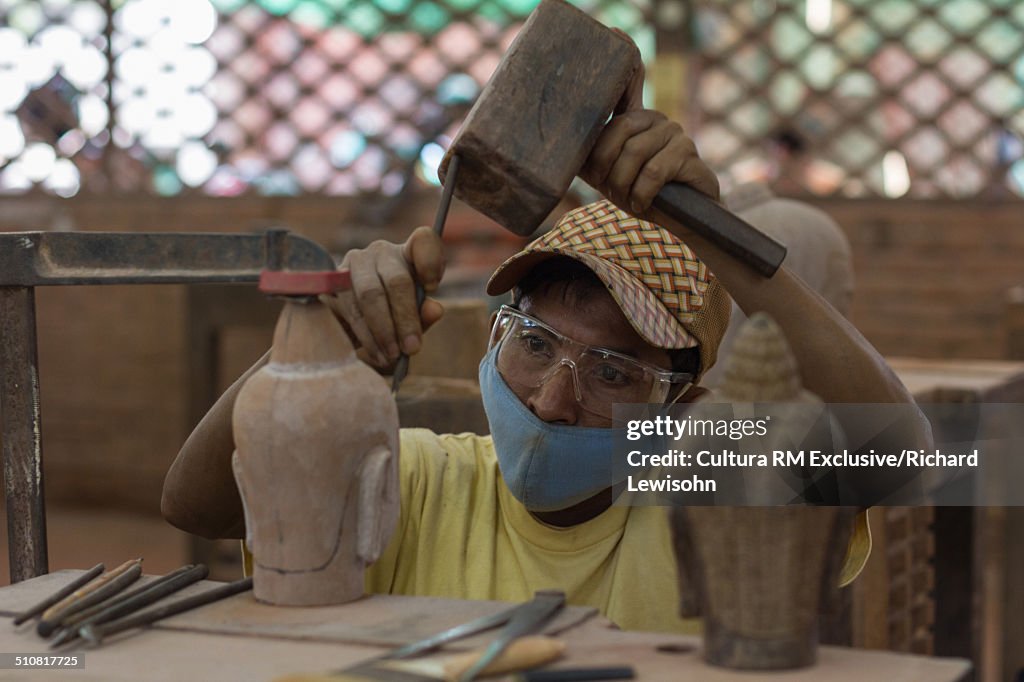 Male artisan carving, Artisans Angkor, Siem Reap, Chiang Mai, Thailand, Southeast Asia