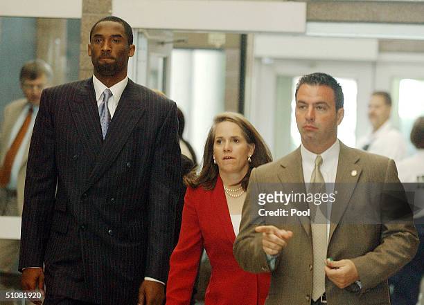 Los Angeles Lakers star Kobe Bryant arrives with his attorney Pamela Mackey at the Eagle County Courthouse July 19, 2004 in Eagle, Colorado. Lawyers...