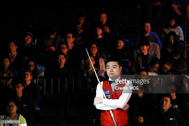 Ding Junhui of China reacts in the third round match against Matthew Selt of England on day three of BetVictor Welsh Open 2016 at Motorpoint Arena on...