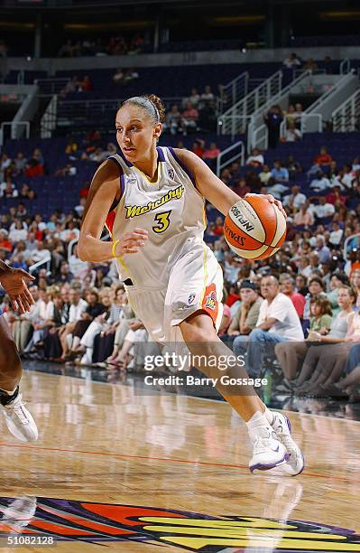 Diana Taurasi of the Phoenix Mercury drives during a game against the New York Liberty at America West Arena on June 24, 2004 in Phoenix, Arizona....