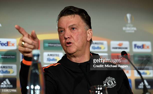 Louis van Gaal, Manager of Manchester United addresses the media during a press conference ahead of the UEFA Europa League Round of 32 match between...