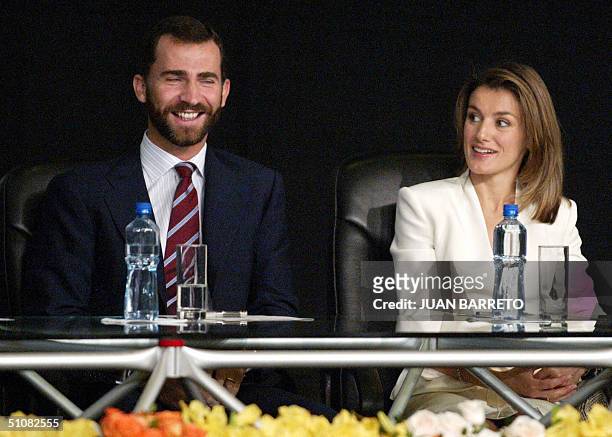 Spain's Prince Felipe and his wife Letizia Ortiz share a laugh during the opening of the XV Congress of the Hispanist International Association in...