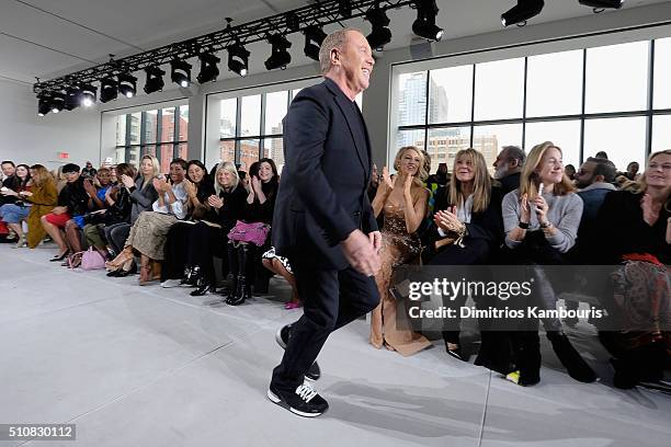 Designer, Michael Kors, walks the runway during the Michael Kors Fall 2016 During New York Fashion Week: The Shows at Spring Studios on February 17,...