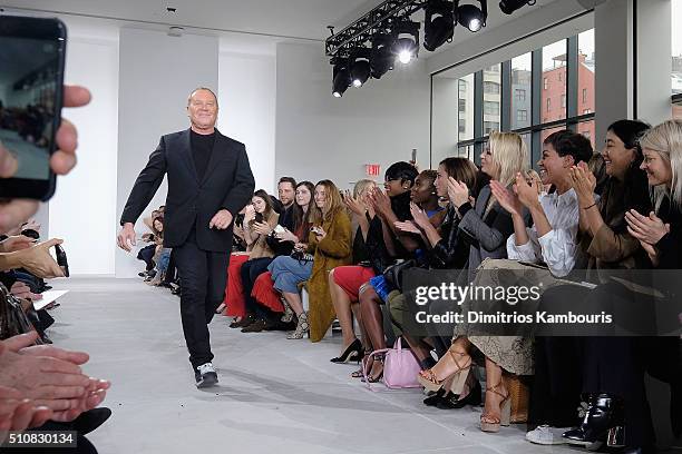 Designer, Michael Kors, walks the runway during the Michael Kors Fall 2016 During New York Fashion Week: The Shows at Spring Studios on February 17,...