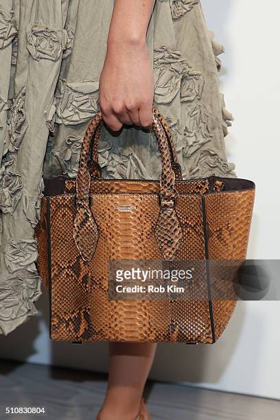 Cush Jumbo, bag detail, attends the Michael Kors show during Fall 2016 New York Fashion Week: The Shows at Spring Studios on February 17, 2016 in New...