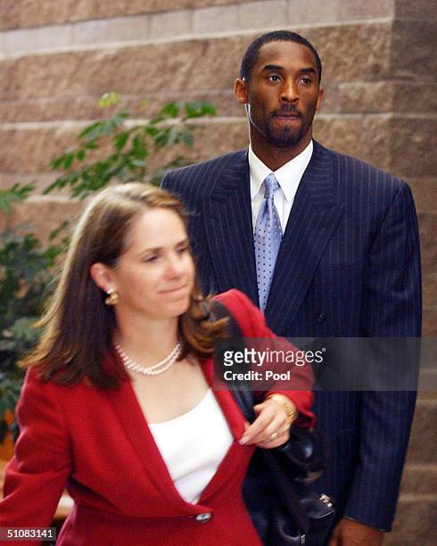 Los Angeles Lakers star Kobe Bryant and his attorney Pamela Mackey leave the Eagle County Justice Center after a day of pre-trial hearings July 19,...