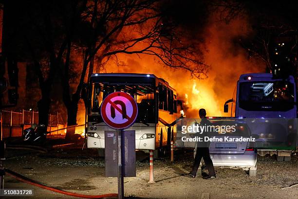 Turkish army service busses burn after an explosion on February 17, 2016 in Ankara, Turkey. 21 people are believed to have been killed and at least...