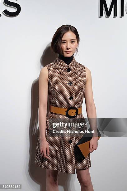 Actress Liu Shishi attends the Michael Kors Fall 2016 Runway Show during New York Fashion Week: The Shows at Spring Studios on February 17, 2016 in...