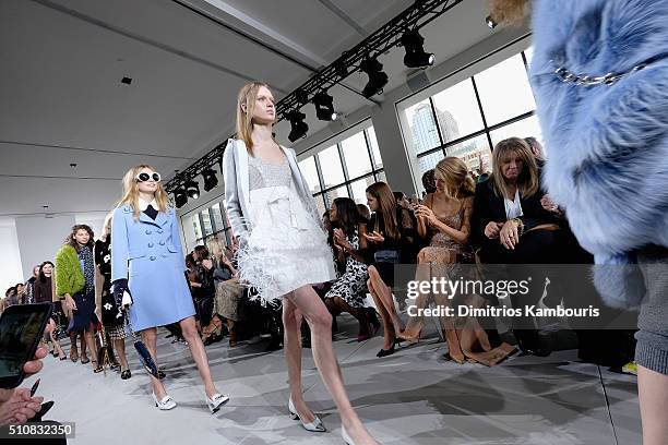 Naomie Harris, Riley Keough, Blake Lively, and Elaine Lively watch as models walk the runway during the Michael Kors Fall 2016 Runway Show during New...