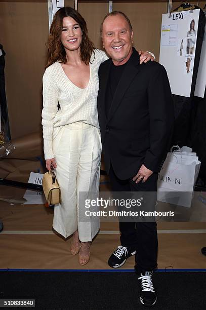 Hanneli Mustaparta and Designer Michael Kors pose backstage at the Michael Kors Fall 2016 Runway Show during New York Fashion Week: The Shows at...