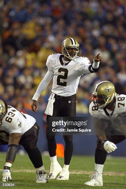 Quarterback Aaron Brooks of the New Orleans Saints signals during the game against the New England Patriots at Foxboro Stadium in Foxboro,...