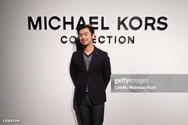 Chen Bolin poses backstage at the Michael Kors Fall 2016 Runway Show during New York Fashion Week: The Shows at Spring Studios on February 17, 2016...