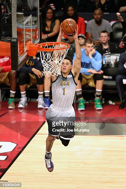 Devin Booker of the USA Team dunks during the BBVA Compass Rising Stars Challenge as part of the 2016 NBA All Star Weekend on February 12, 2016 at...