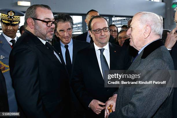 King Mohammed VI of Morocco, President of the 'Institut du Monde Arabe' Jack Lang, French President Francois Hollande and Pierre Berge attend King...