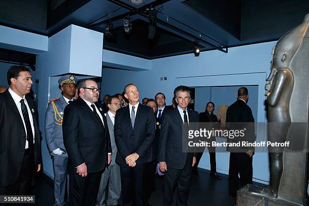 King Mohammed VI of Morocco, Curator of the exhibition Franck Goddio and President of the 'Institut du Monde Arabe' Jack Lang visit the 'Osiris,...