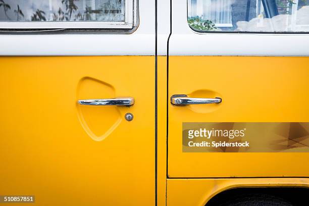 yellow vw bus close up - volkswagen bus stock pictures, royalty-free photos & images