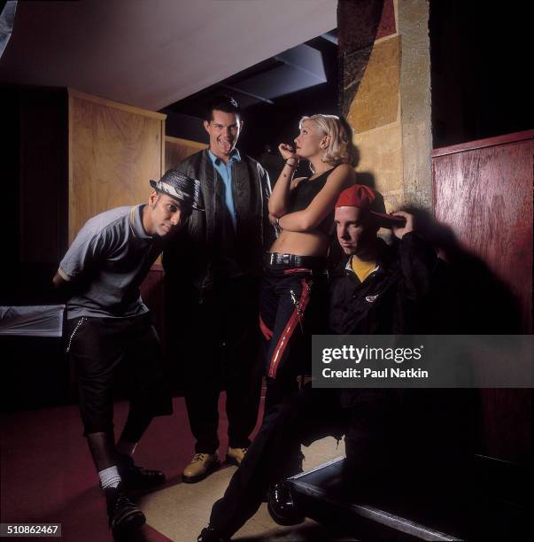 Portrait of American band No Doubt as they pose backstage at the Metro nightclub, Chicago, Illinois, August 9, 1996. Pictured are, from left, Tony...