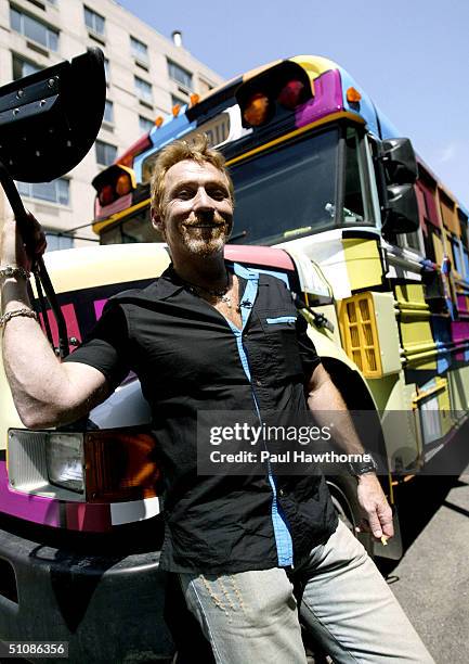 Danny Bonaduce poses in front of the new Partridge Family bus during VH-1's open audition for the new reality show "In Search of the Partridge...