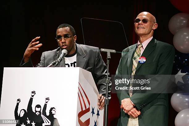 Rapper/actor Sean "P. Diddy" Combs gestures as he speaks while political consultant James Carville listens during a press conference to announce...
