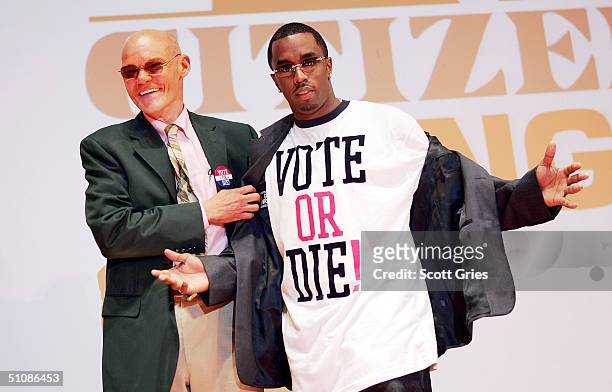 Artist Sean "P. Diddy" Combs and political consultant James Carville pose for photos during a press conference to announce plans for the Citizen...