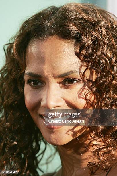 Actress Halle Berry attends the premiere of Warner Bros. "Catwoman" at the ArcLight Theatre on July 19, 2004 in Hollywood, California.