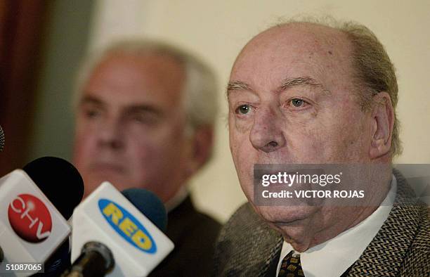 Chilean lawyer Guillermo Ruiz Pulido, representative of the State Defense Council of Chile speaks during a press conference 20 July, 2004 in...