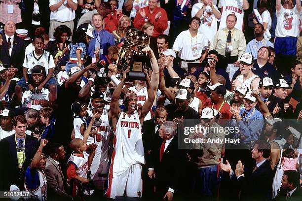 Chauncey Billups of the Detroit Pistons holds his Most Valuable Player Trophy after Game Five of the 2004 NBA Finals on June 15, 2004 at The Palace...