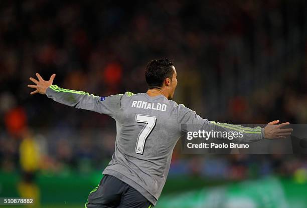 Cristiano Ronaldo of Real Madrid CF celebrates after scoring the opening goal during the UEFA Champions League round of 16 first leg match between AS...