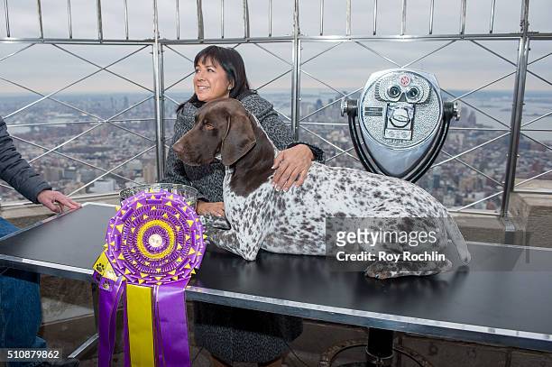Westminster Kennel Club's Best In Show C.J. The German shorthaired pointer and Handler Valerie Nunes-Atkinson Visit The Empire State Building on...