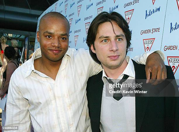 Actor Donald Faison and director/actor Zach Braff arrive at the premiere of Fox Searchlight Pictures' "Garden State" on July 20, 2004 at the...