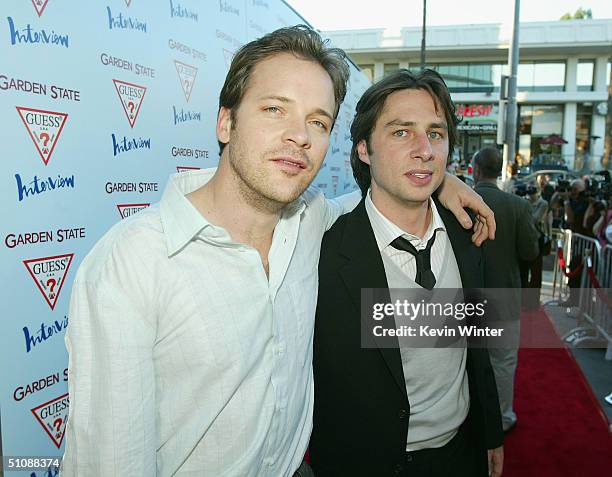 Actor Peter Sarsgaard and director/actor Zach Braff arrive at the premiere of Fox Searchlight Pictures' "Garden State" on July 20, 2004 at the...