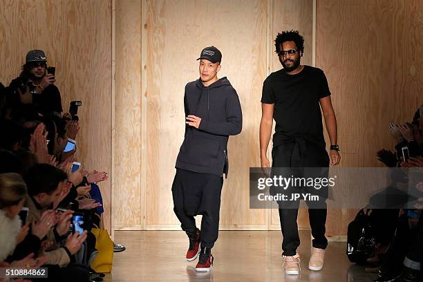 Designers Dao-Yi Chow and Maxwell Osborne walk the runway wearing DKNY Women's Fall 2016 during New York Fashion Week: The Shows at Skylight Modern...