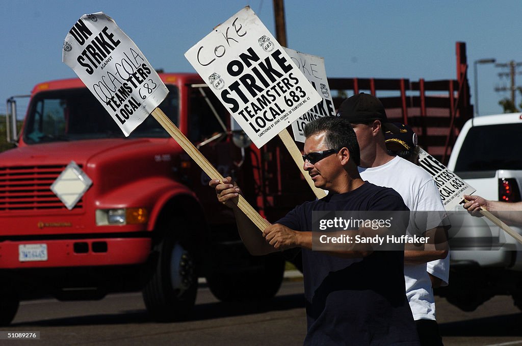 CocaCola employees with Teamsters Union 683, walk the picket line